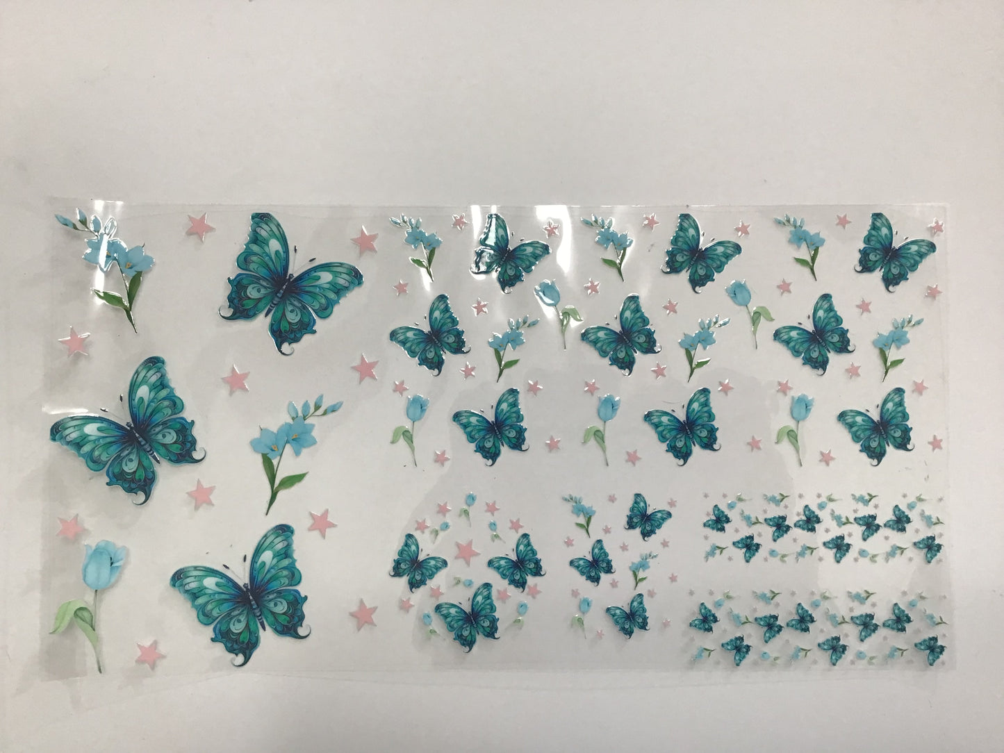 TEAL BUTTERFLIES